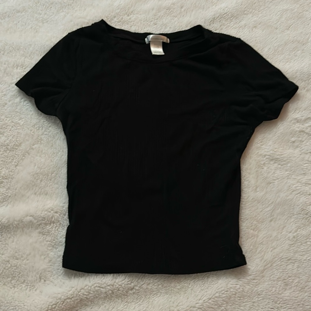 selling because don’t fit hole on sleeve, brand bozzolo, size small, color black